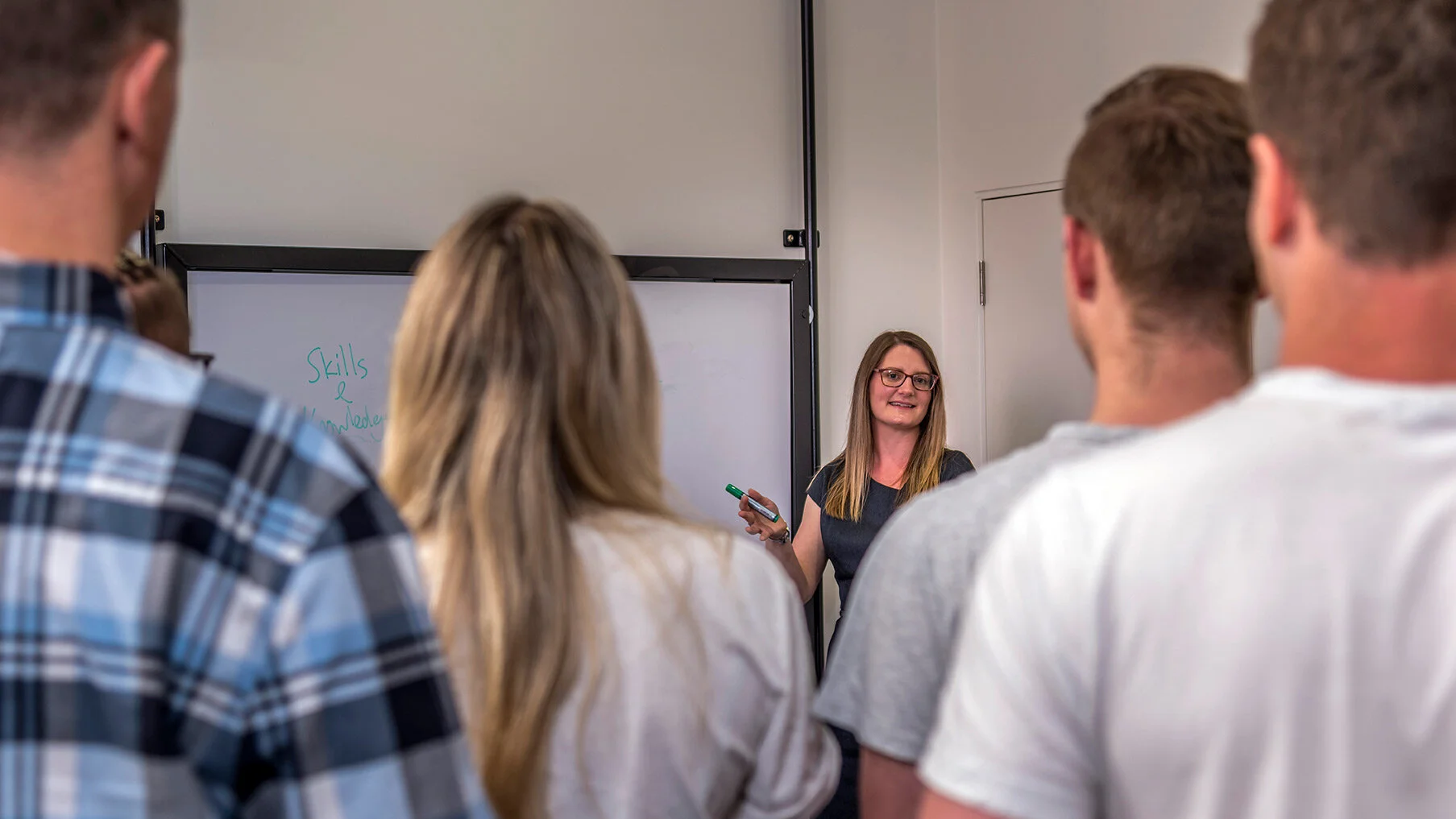 lifeincolour coaches working with a team
